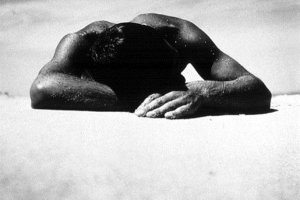 Sunbaker is a 1937 black-and-white photograph by Australian modernist photographer Max Dupain, depicting the head and shoulders of a man lying on a beach, taken from a low angle. (Wikimedia)