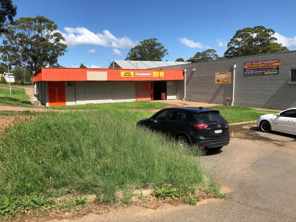 Airds Shopping Centre Front from footpath with grass 2020 IW lowres